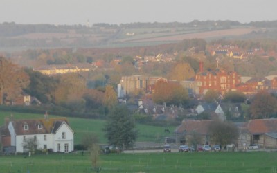 The autumn sun setting over the Farmhouse